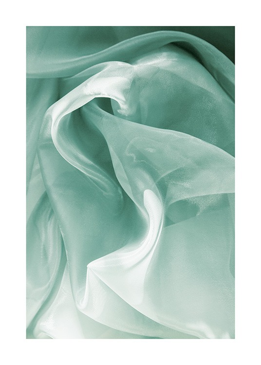  – Primer plano de una tela delicada y transparente en color turquesa.