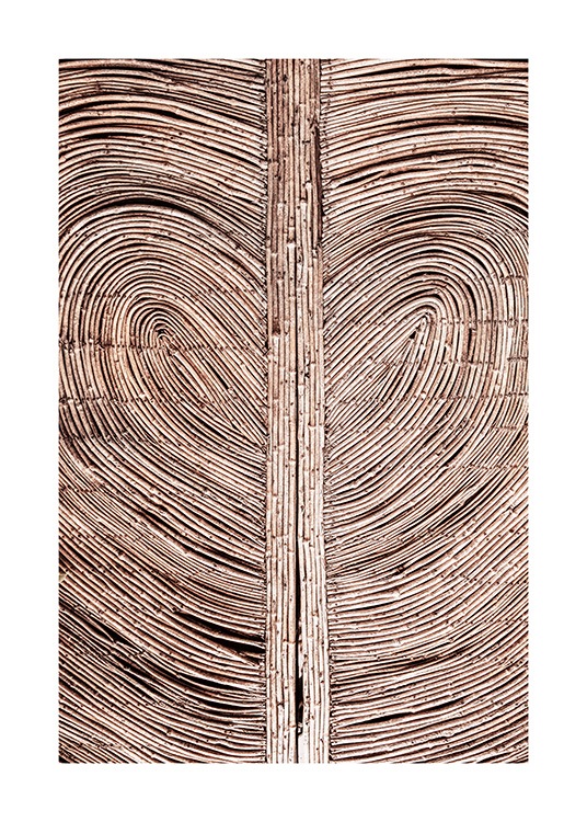  – Fotografía de varillas de madera que van formando un corazón en la composición del patrón.
