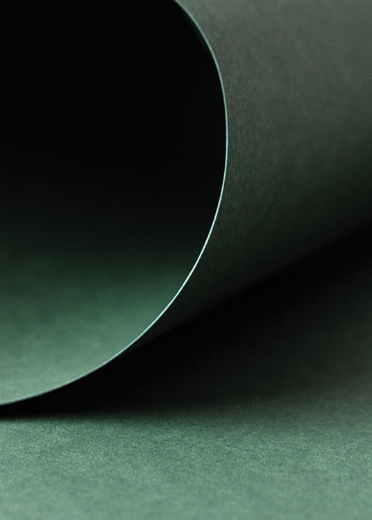  – Primer plano de una hoja de papel verde oscuro.